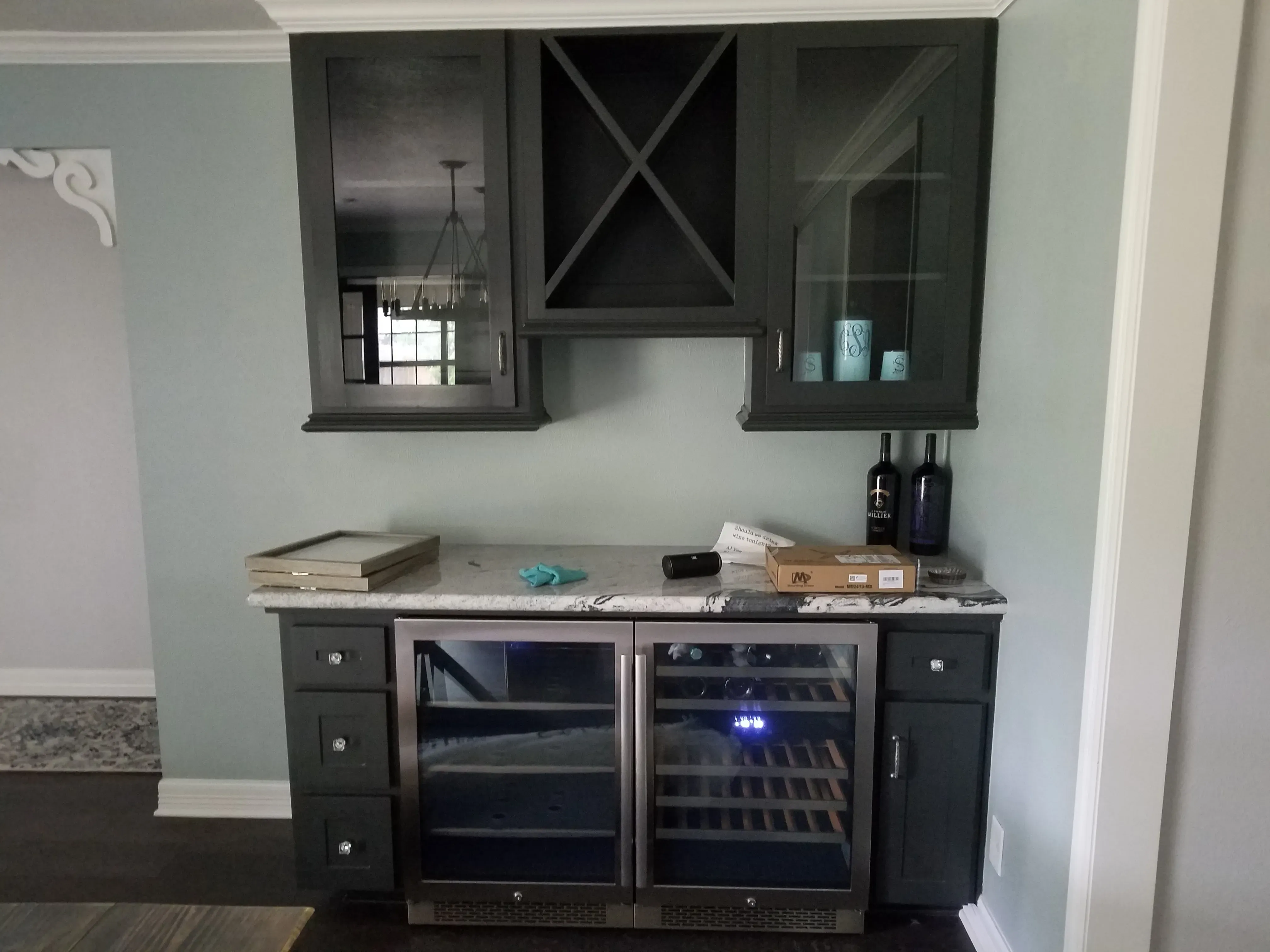 Home office built-in desk and shelving unit with file drawer storage