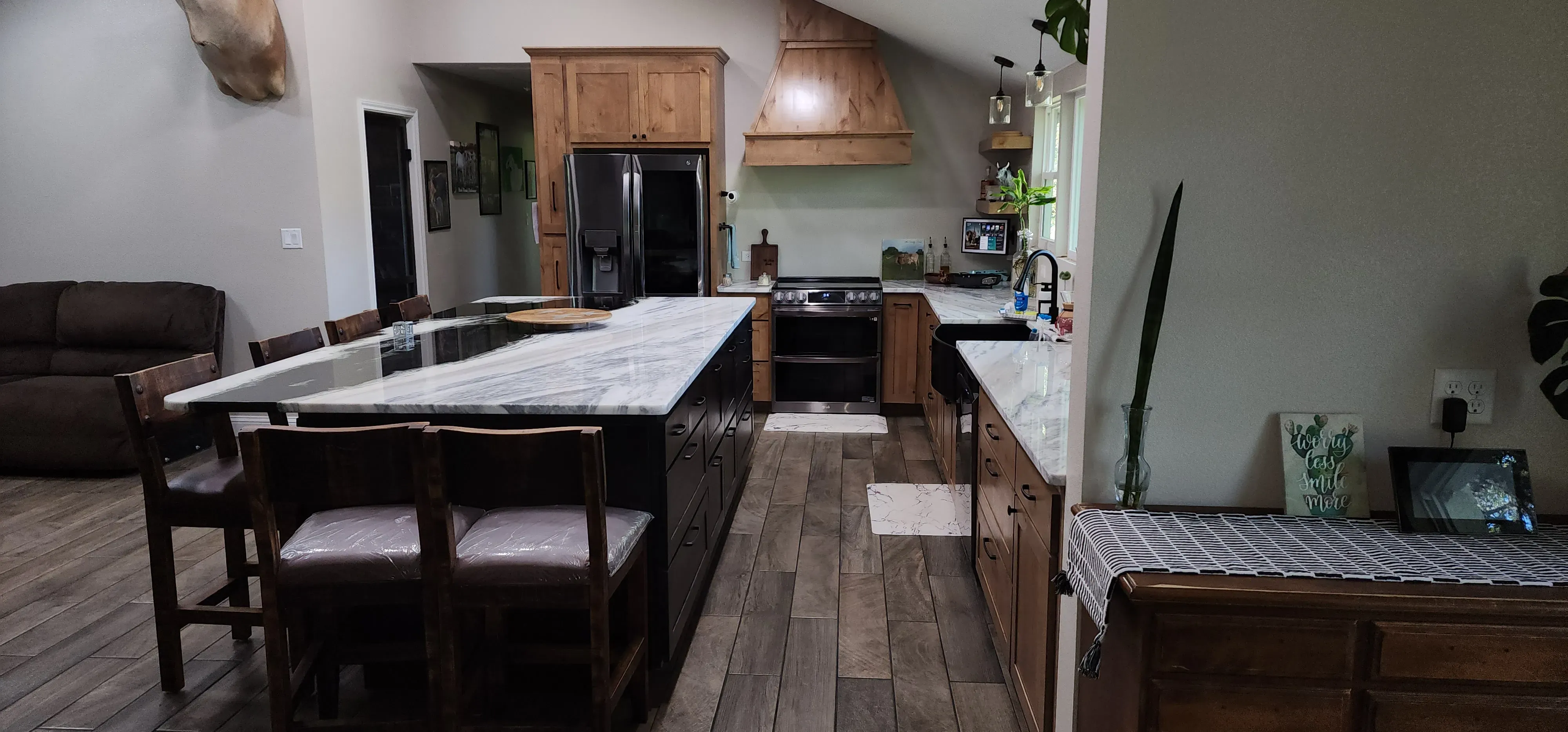 L-shaped kitchen layout with custom corner cabinet and lazy Susan insert