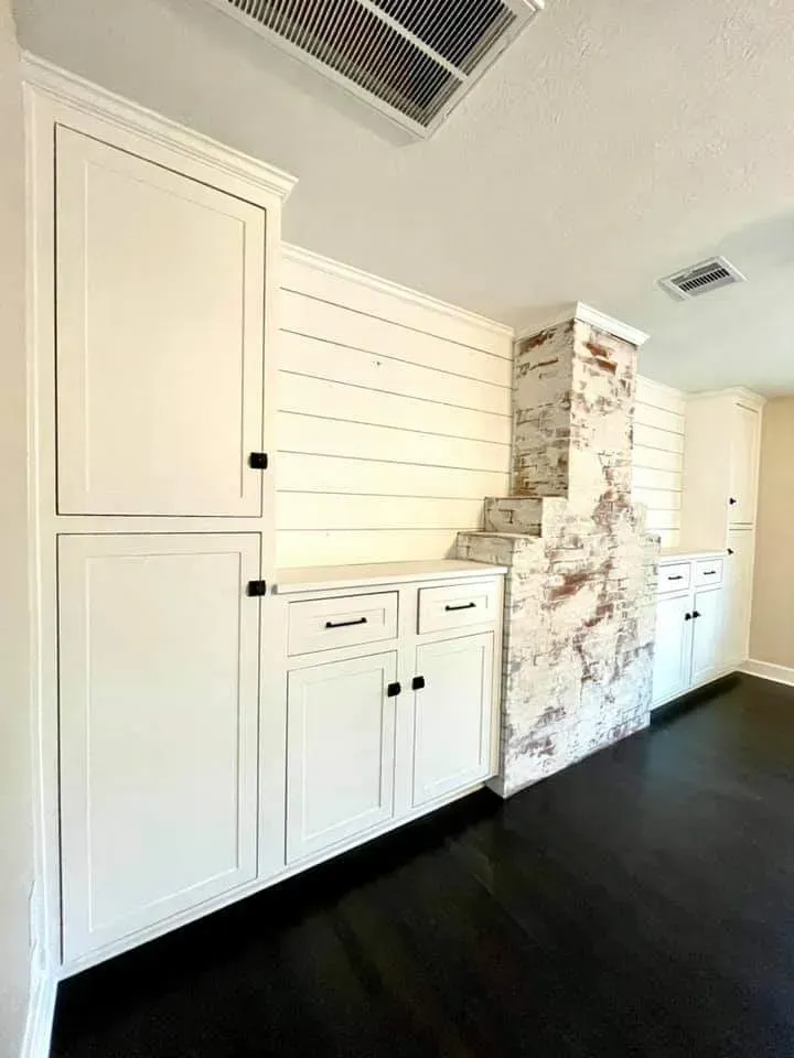 Custom reach-in closet organizer with double hang section and pull-out tie rack